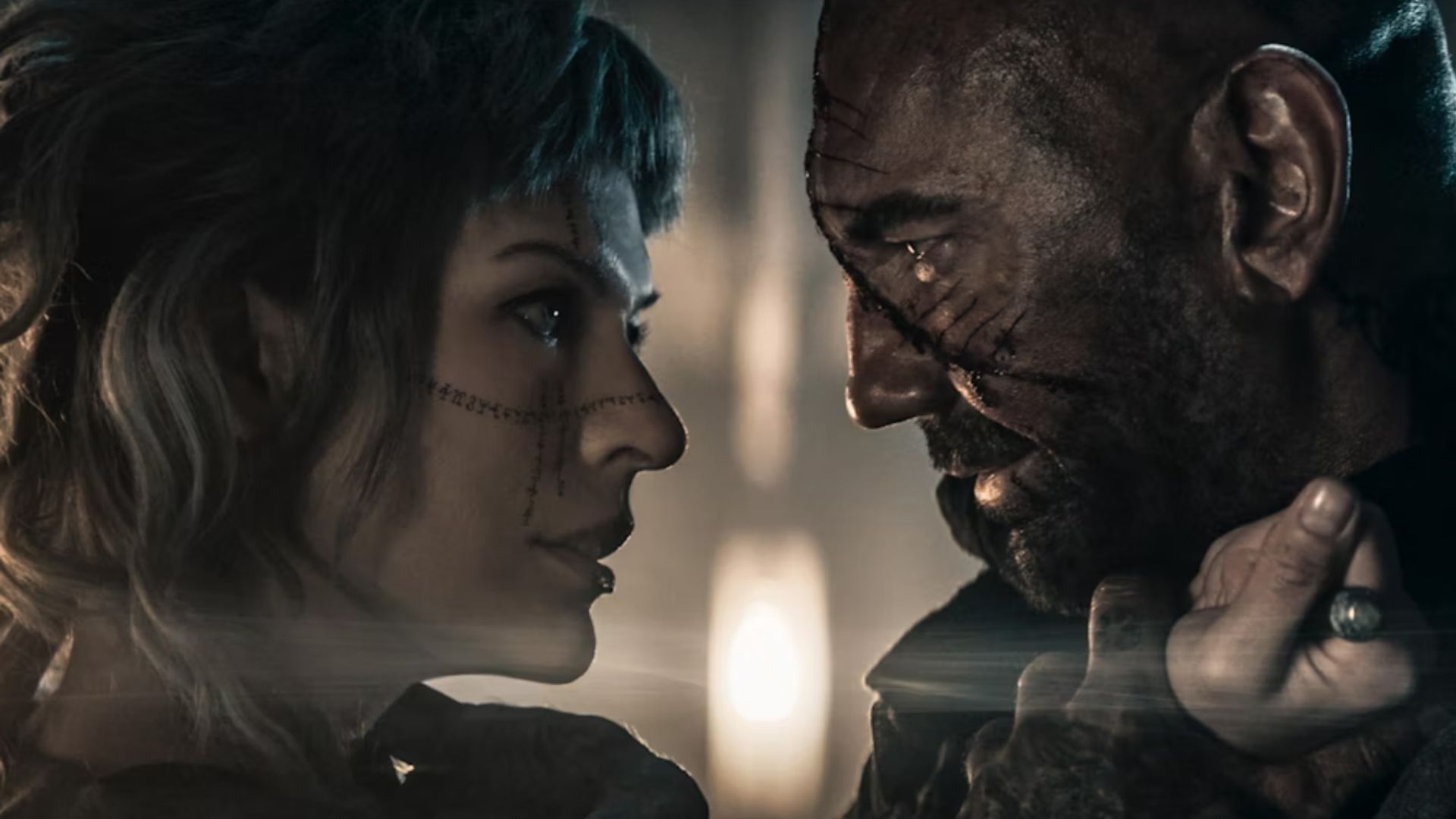 Milla Jovovich and Dave Bautista in In the Lost Lands