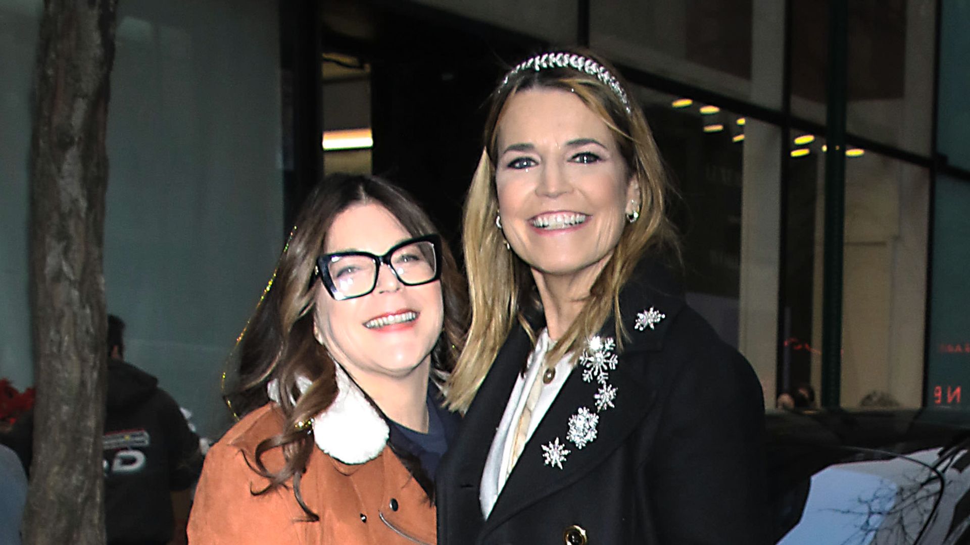 Annie Guthrie in orange jacket and Savannah Guthrie in black coat are seen arriving at NBC's 'Today' Show 