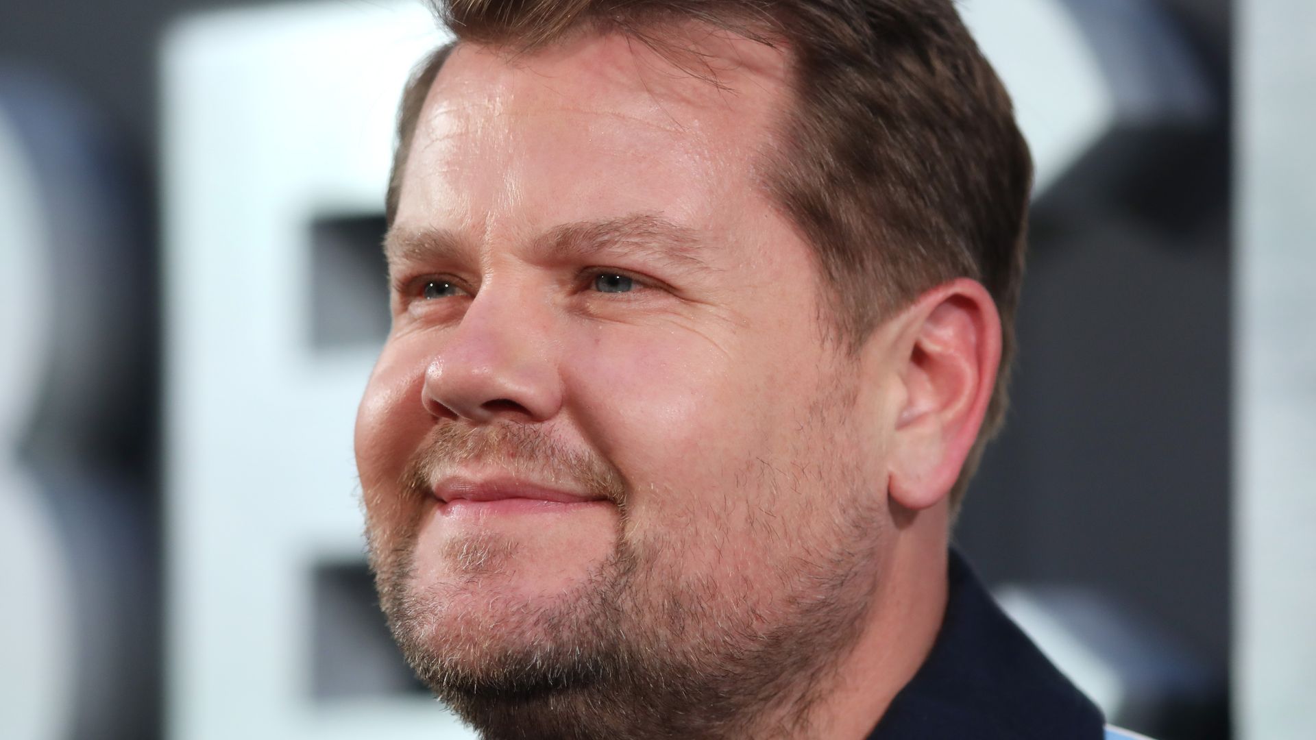 james corden smiling at premiere