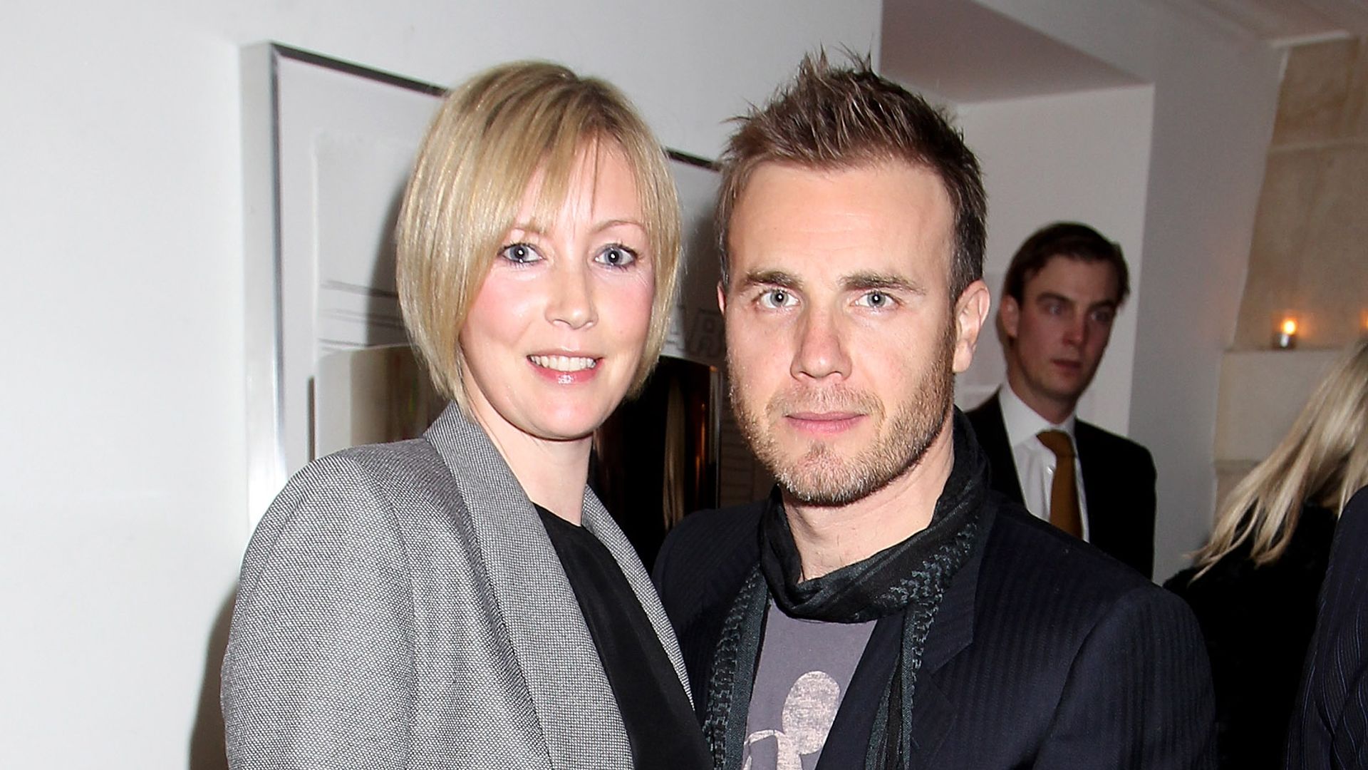 Gary Barlow and wife Dawn smiling at an event together 