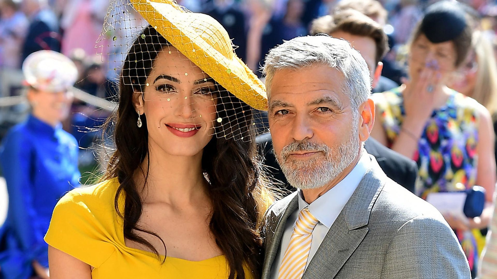 Amal and George Clooney arrive at St George's Chapel at Windsor Castle before the wedding of Prince Harry to Meghan Markle on May 19, 2018 in Windsor, England. (Photo by Ian West - WPA Pool/Getty Images)