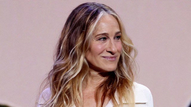 Sarah Jessica Parker looking sideways in white dress