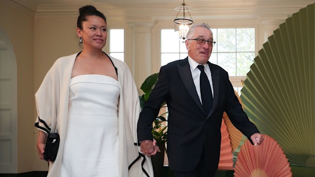 WASHINGTON, DC - APRIL 10: Actor Robert De Niro (R) and Tiffany Chen arrive at the White House for a state dinner on April 10, 2024 in Washington, DC. U.S. President Joe Biden and first lady Jill Biden are hosting a state dinner for Japanese Prime Minister Fumio Kishida as part of his official state visit.  (Photo by Tasos Katopodis/Getty Images)