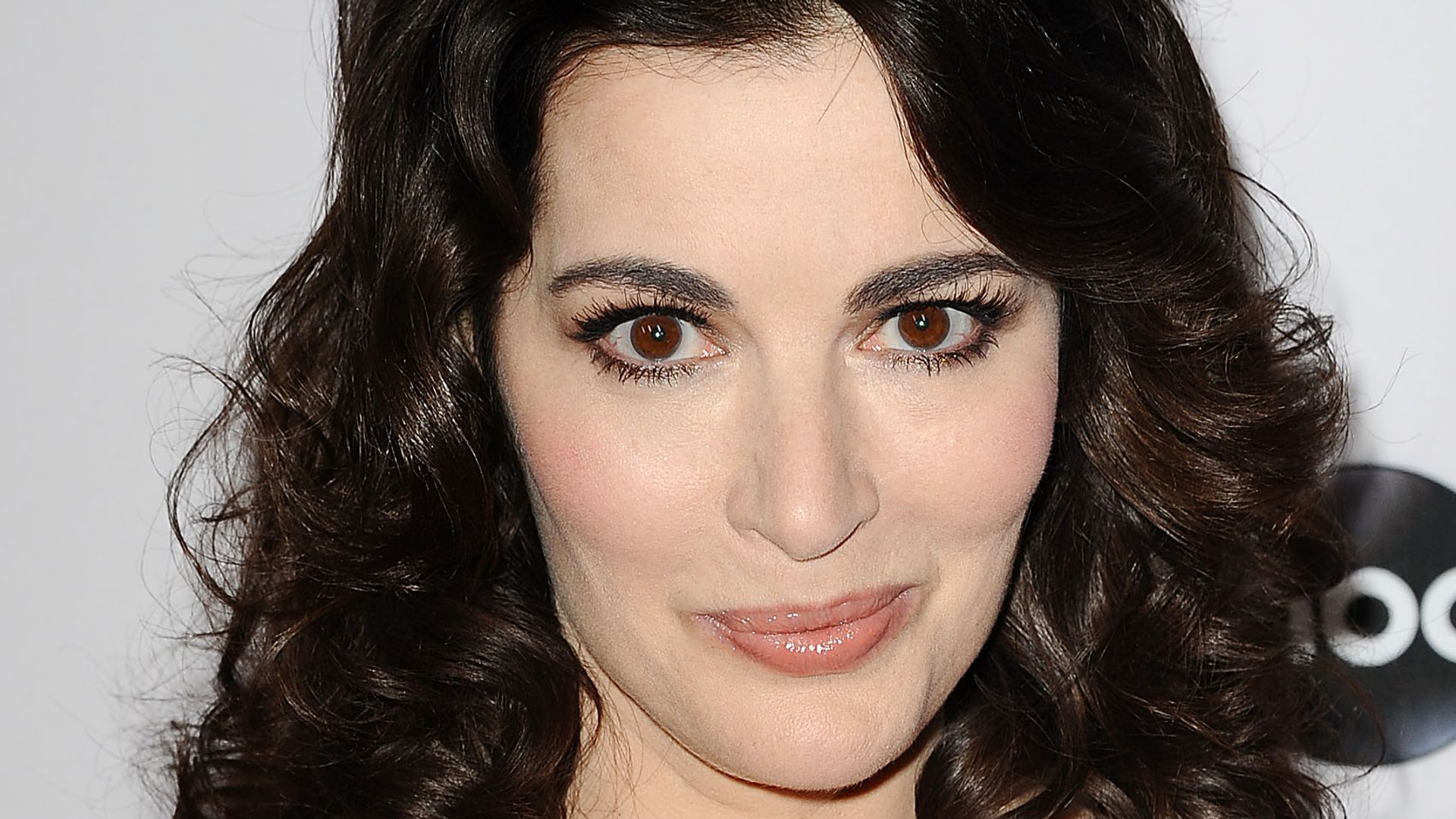 Nigella Lawson posed in red dress