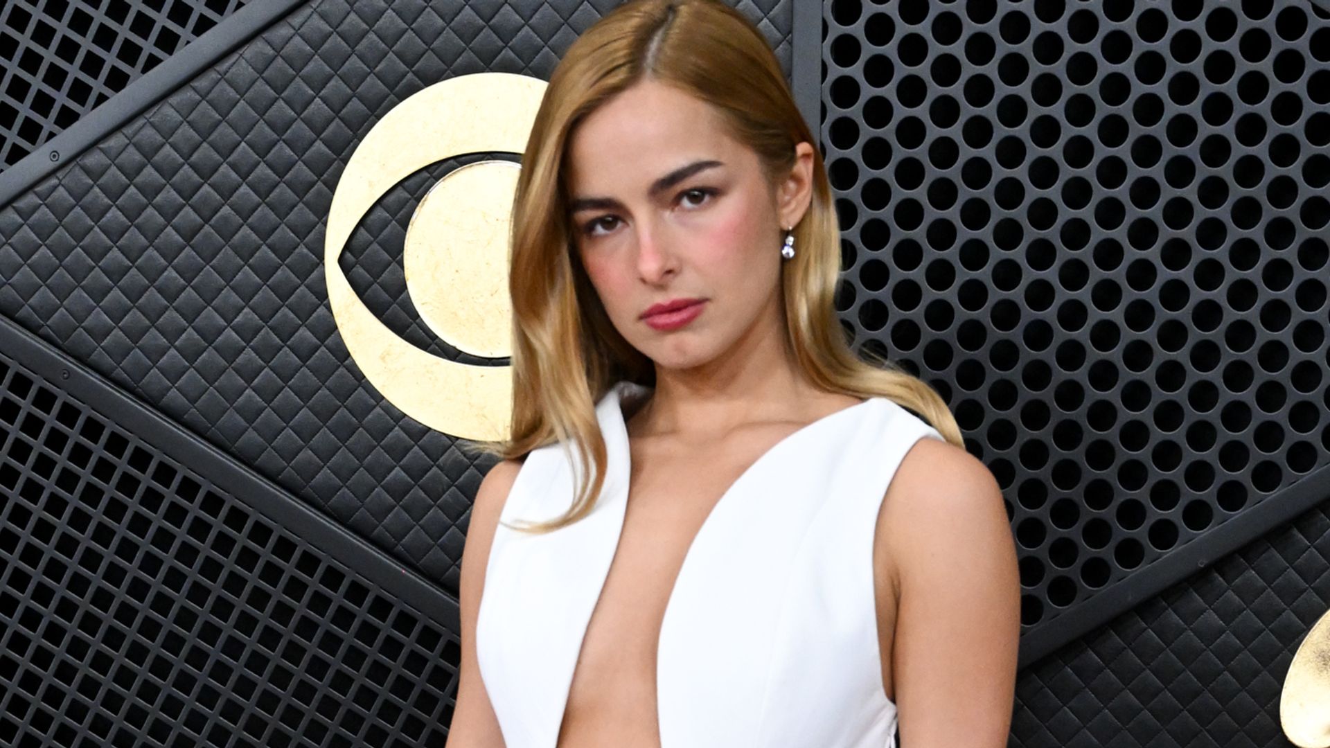 Addison Rae in a plunging white dress at the Grammys