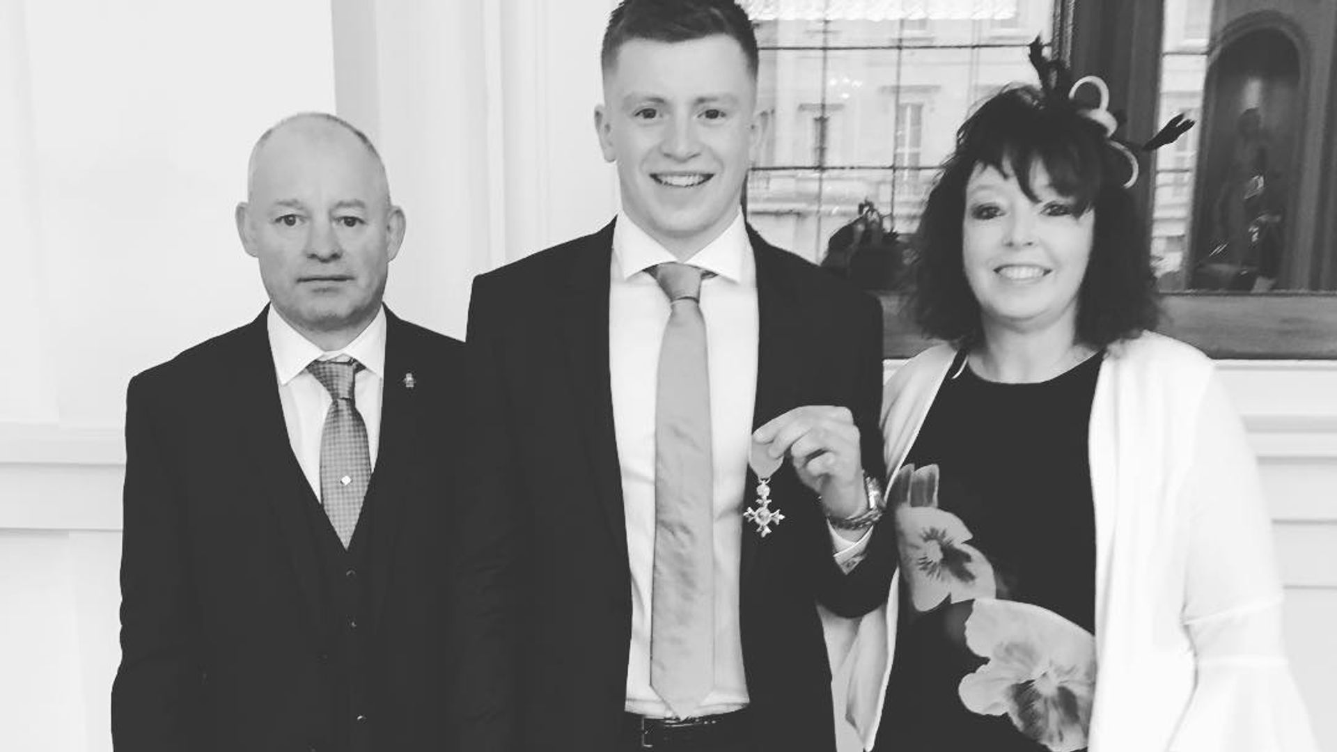 Adam Peaty with his parents