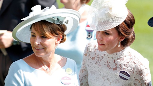 Carole Middleton and Catherine, Duchess of Cambridge standing side by side at Royal Ascot 