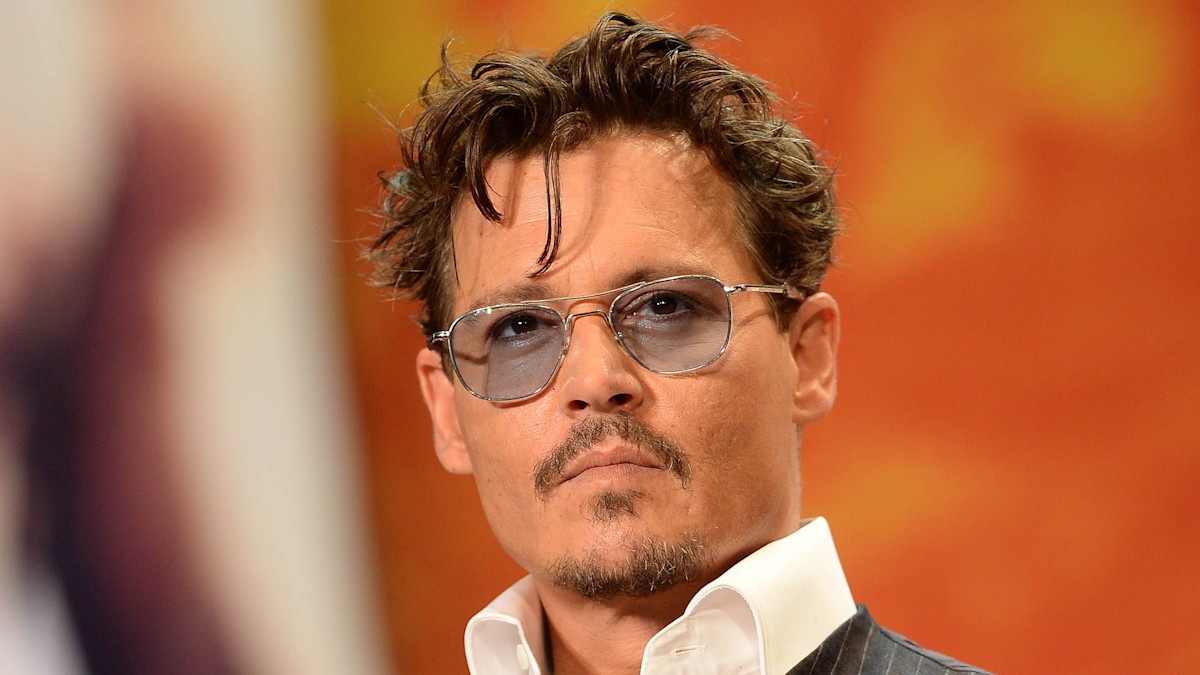 Johnny Depp seen hobbling on crutches and using medical boot amid ongoing tour