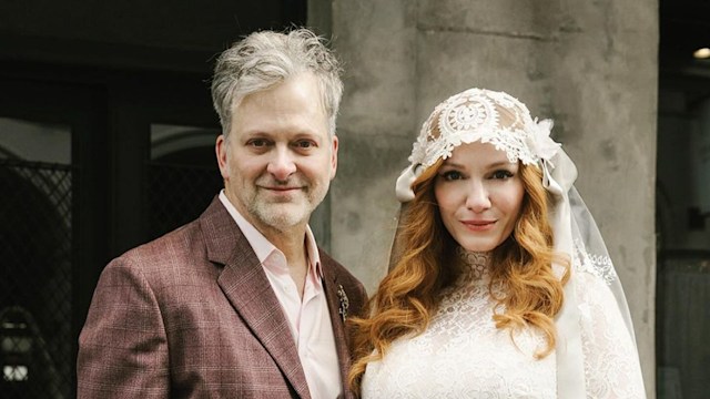 Christina stunned in a white lace bridal gown and veil 