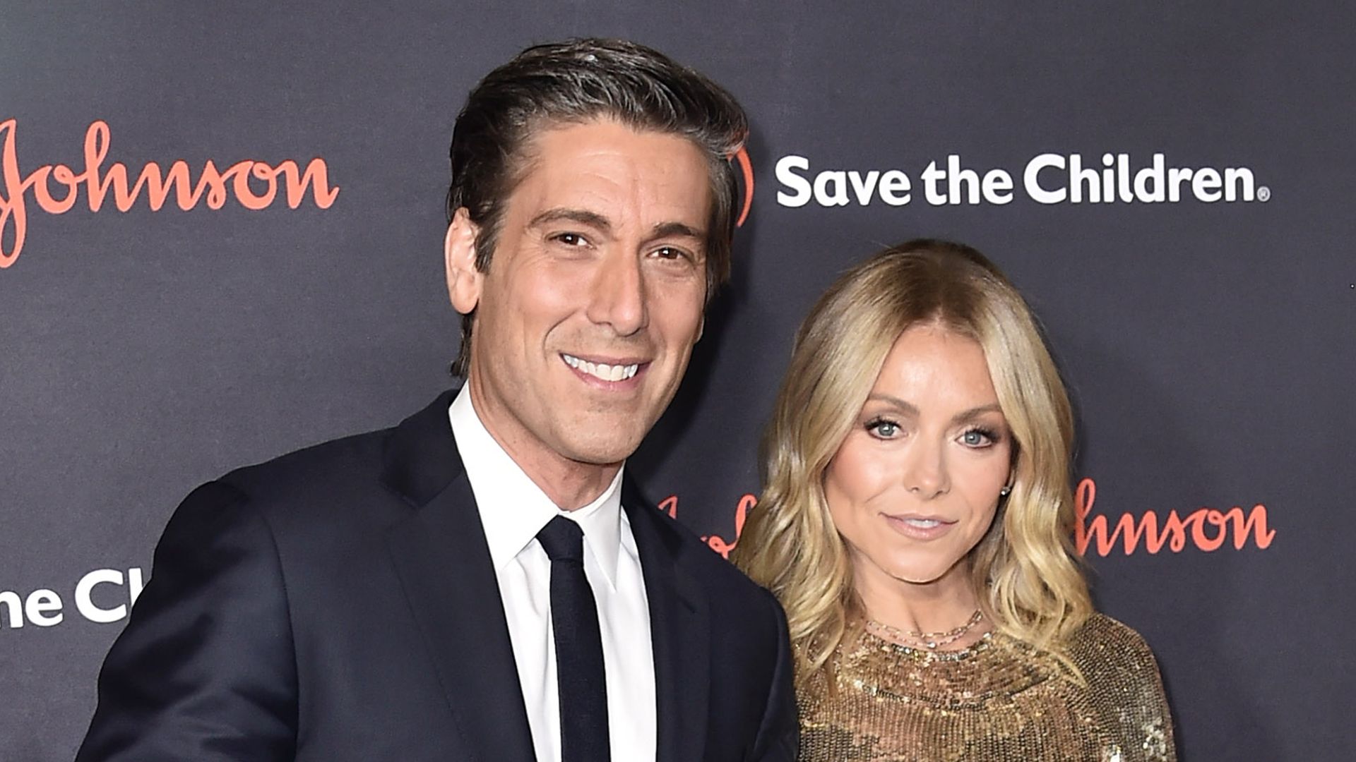 Anchorman/journalist David Muir and actress/TV Host Kelly Ripa attends the 6th Annual Save the Children Illumination Gala at the American Museum of Natural History in New York City on November 14, 2018.