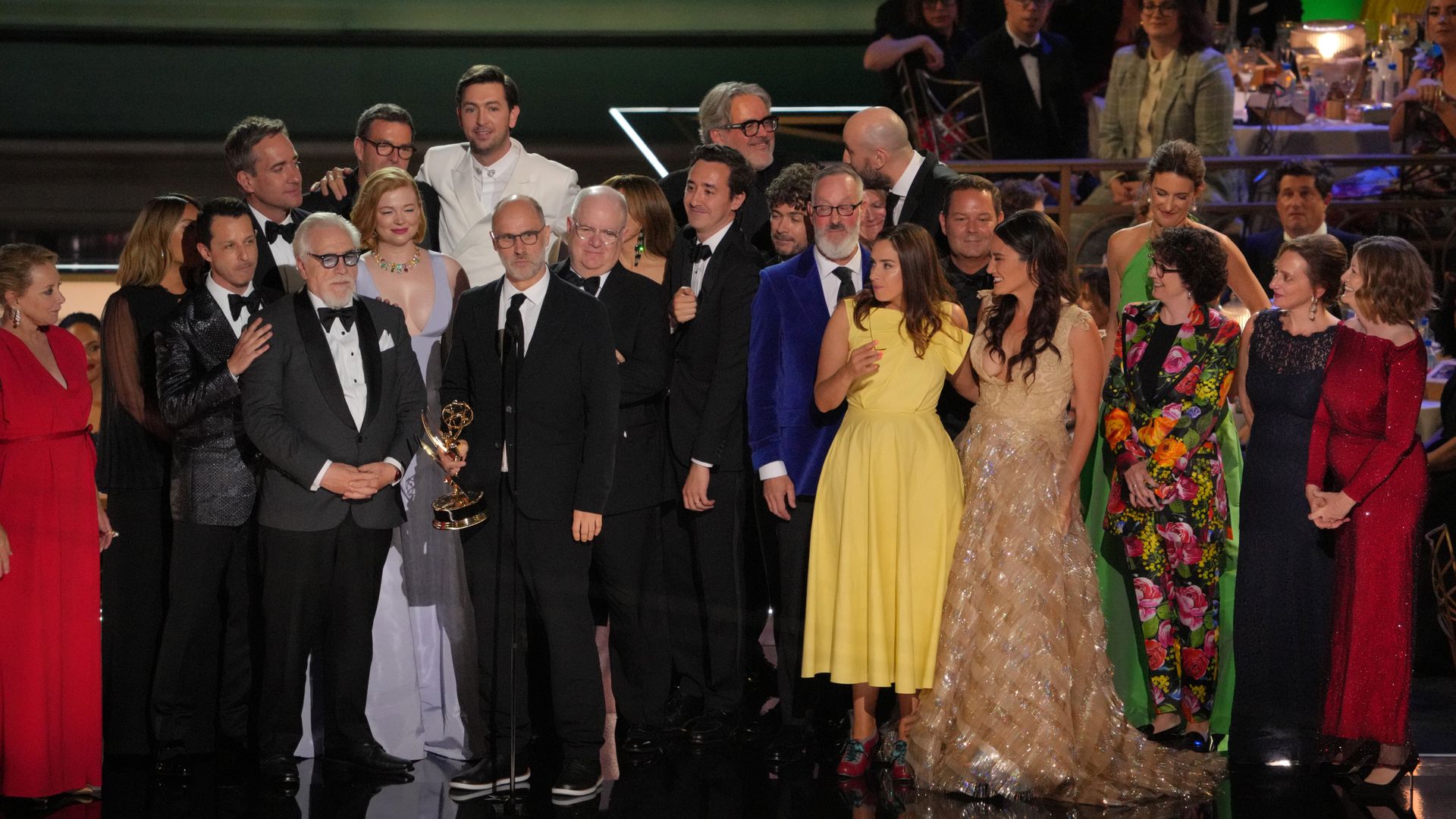 Jesse Armstrong (6th from L, holding trophy) and cast and crew of 'Succession' accept the Outstanding Drama Series award onstage during the 74th Primetime Emmys at Microsoft Theater on September 12, 2022 in Los Angeles, California. 