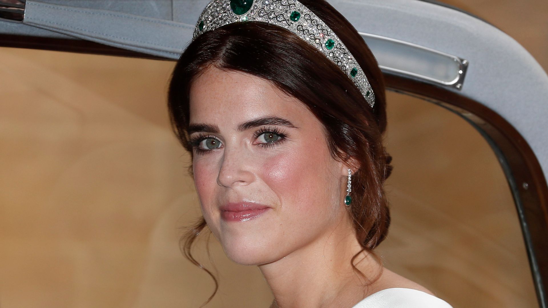 Princess Eugenie in her bridal tiara in a car in during her wedding day in 2018