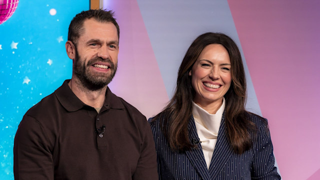 Kelvin Fletcher and Liz Fletcher smiling on the set of Loose Women