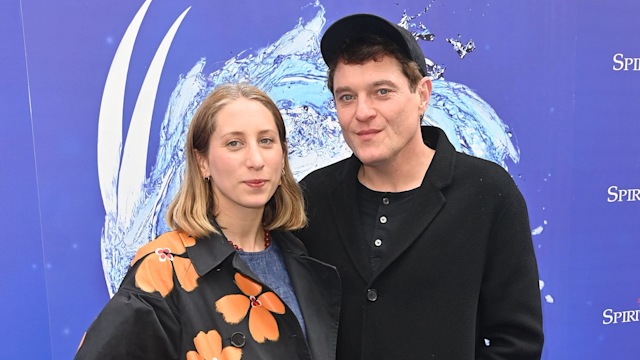 Celina Bassili and Matthew Horne pose for photos at the Spirited Away press night