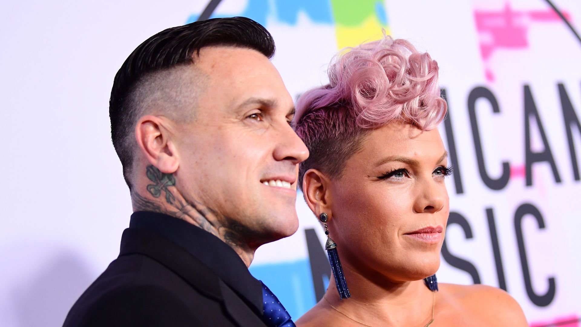 Carey Hart (L) and Pink attend the 2017 American Music Awards at Microsoft Theater on November 19, 2017 in Los Angeles, California