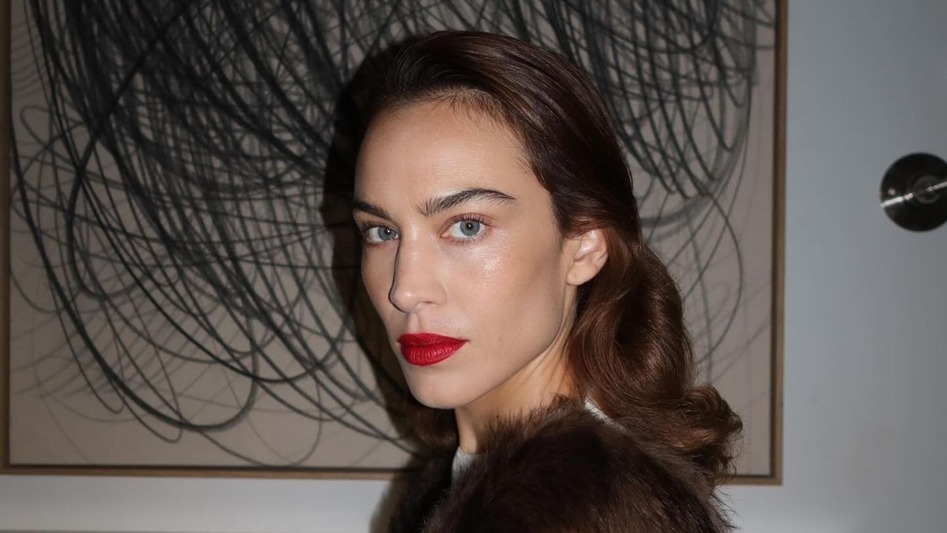 Alexa Chung’s sheer tights and silk pyjama combo is peak It-Girl