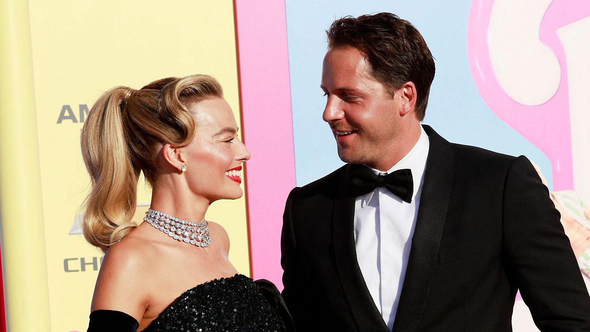 Australian actress Margot Robbie and her husband British producer Tom Ackerley arrive for the world premiere of "Barbie" at the Shrine Auditorium in Los Angeles