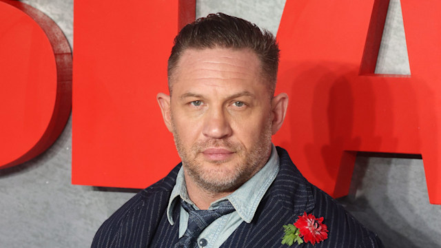 Tom Hardy in a pinstripe suit