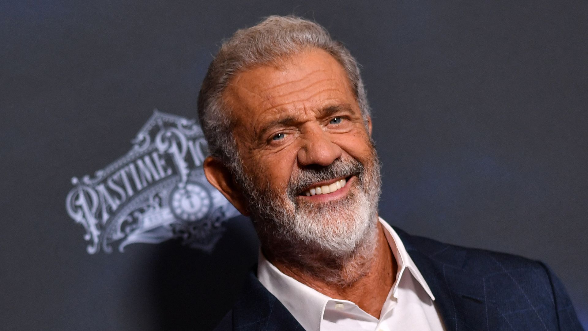 Mel Gibson beams alongside rarely-seen daughter Lucia, 14, and lookalike son, Lars, 7, in ultra-rare family photos