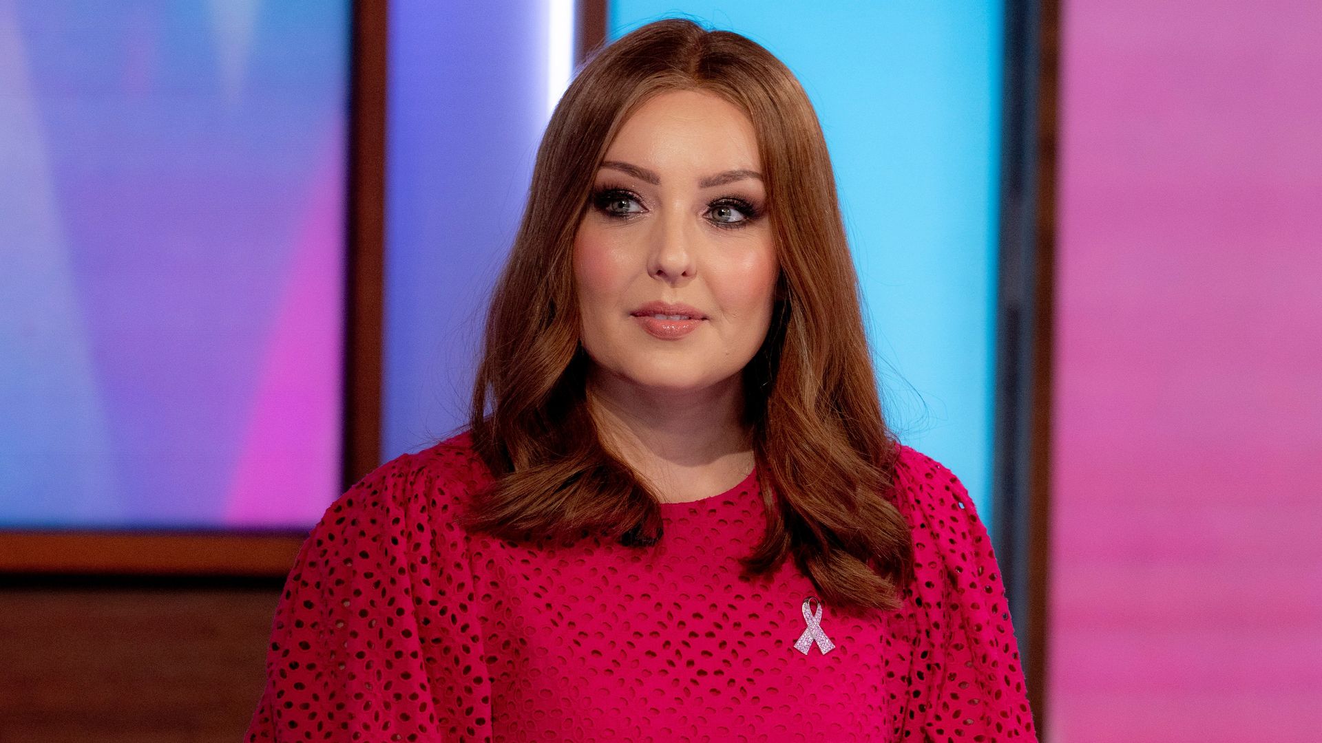 Amy Dowden in red dress on set of Loose Women