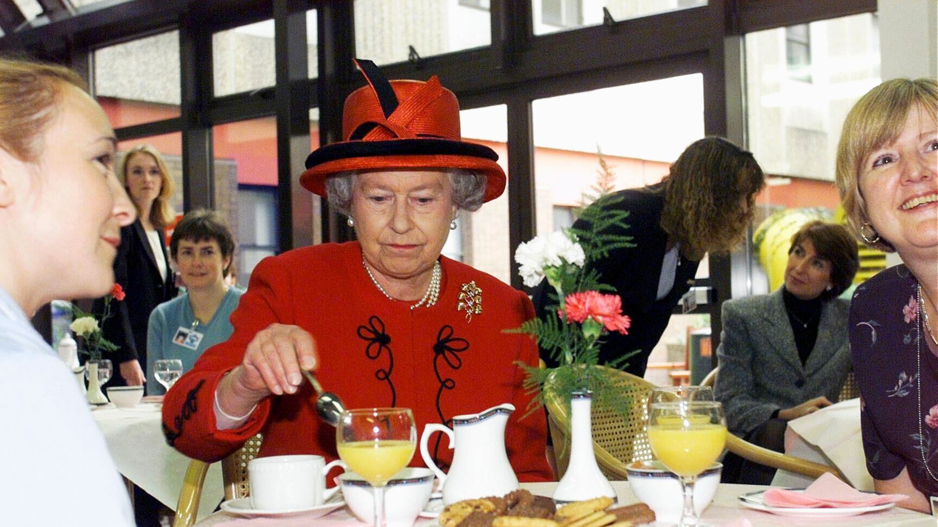 queen taking tea break in canteen 