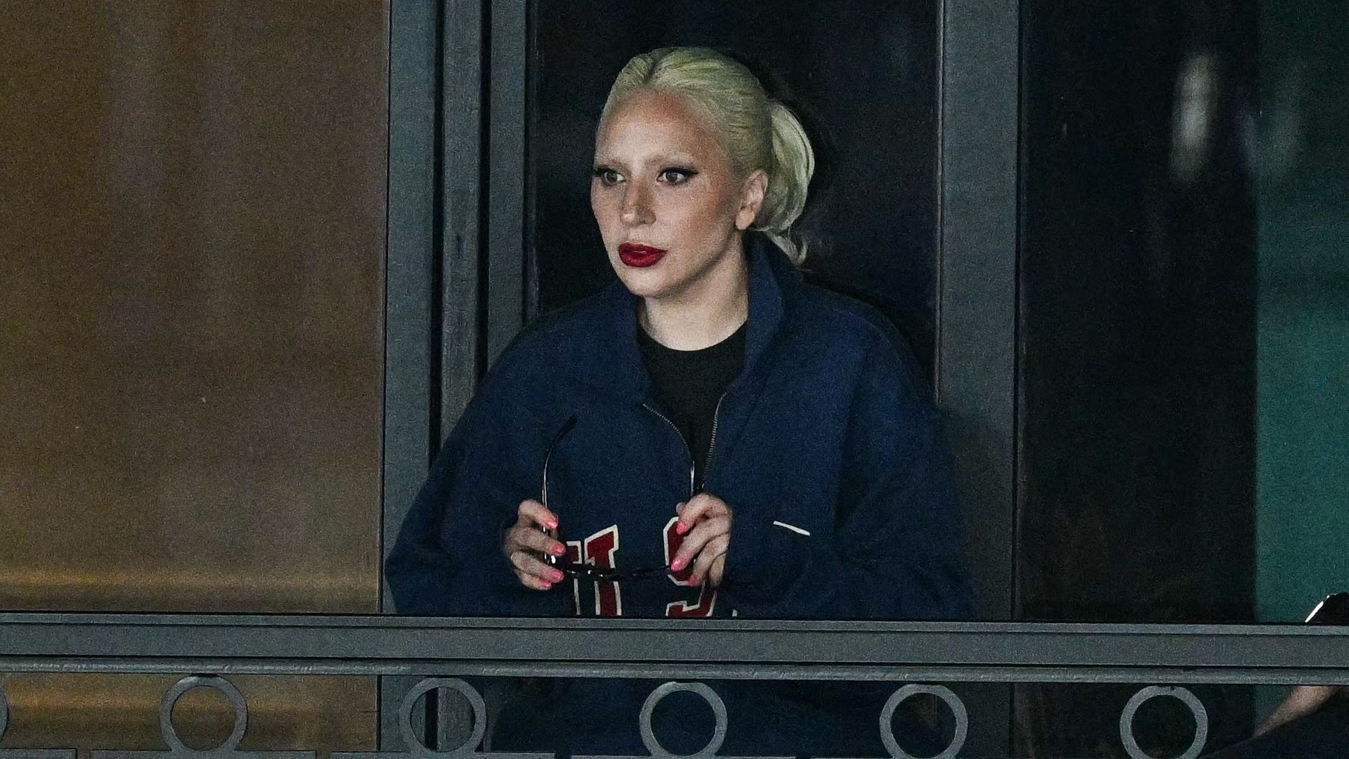 TOPSHOT – US singer and actress Lady Gaga competes in the women's artistic gymnastics qualification during the Paris 2024 Olympic Games at the Bercy Arena in Paris on July 28, 2024.