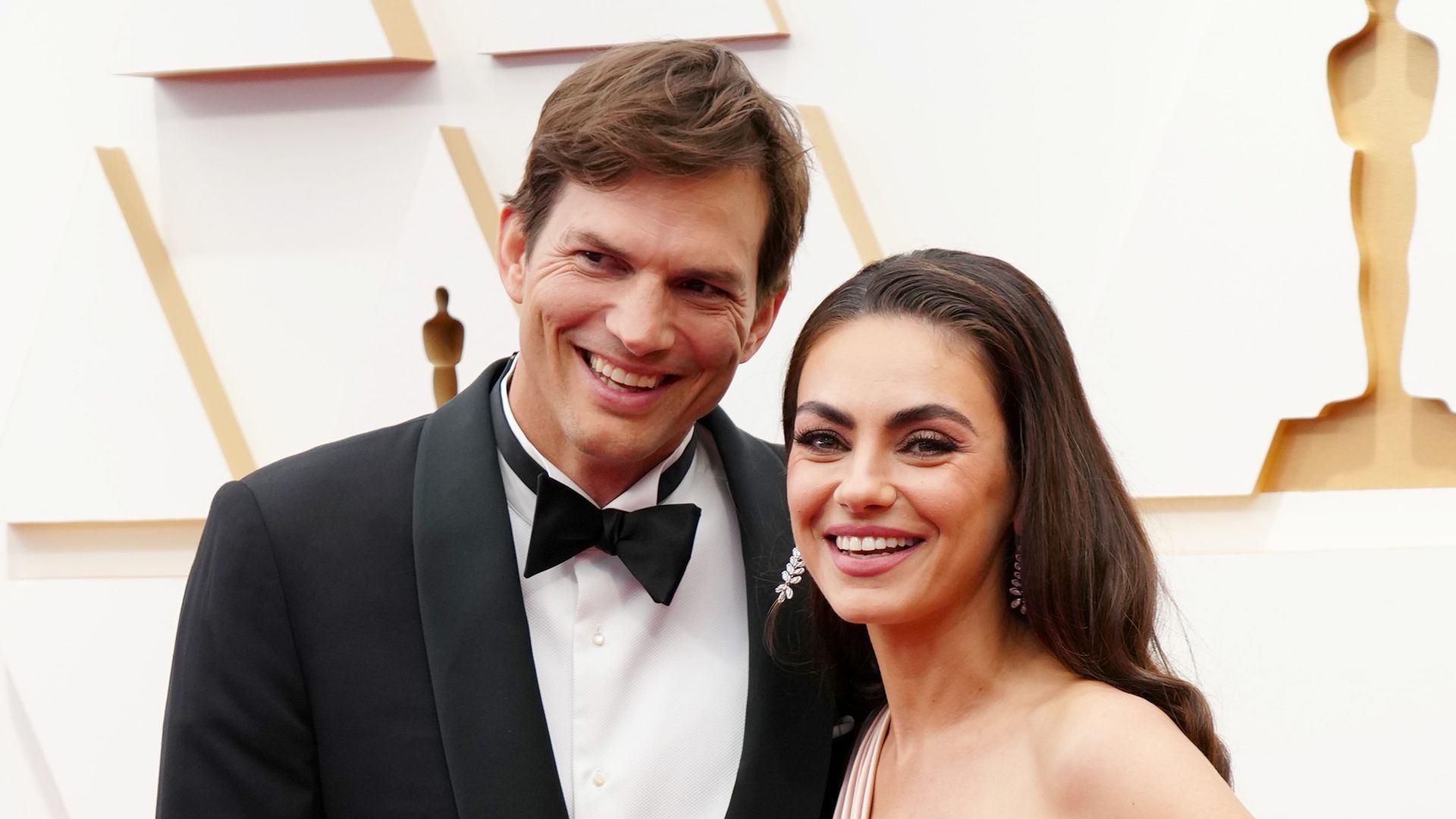 Ashton Kutcher and Mila Kunis attend the 94th Annual Academy Awards at Hollywood and Highland on March 27, 2022 in Hollywood, California