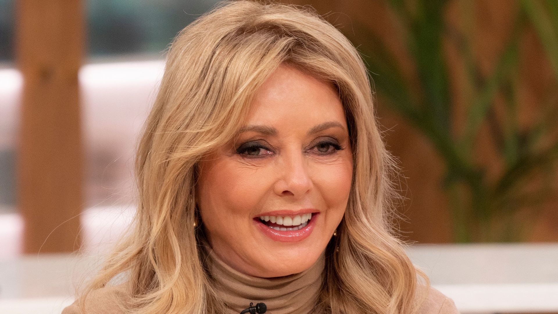 Carol Vorderman debuts haircut she gave herself at home in new video
