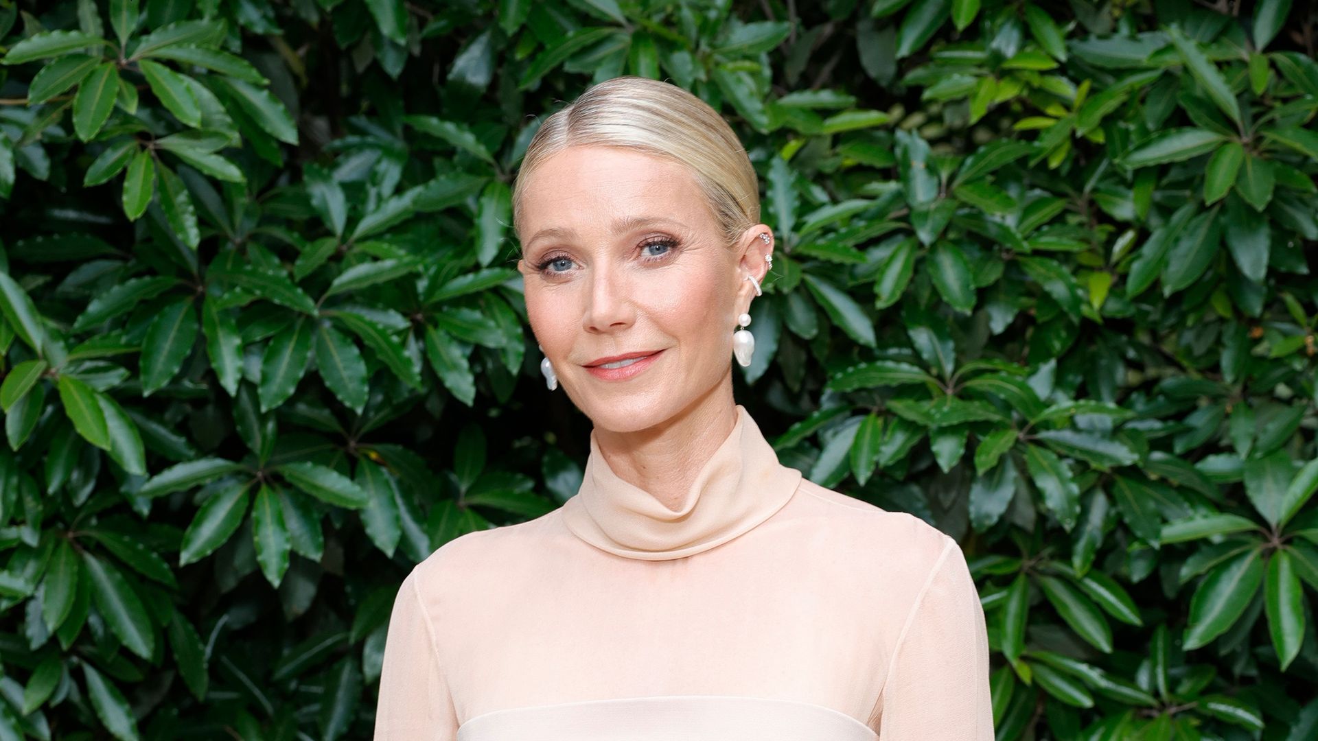 Gwyneth Paltrow's children Apple and Moses tower over her in star-studded photo ahead of family's emotional change