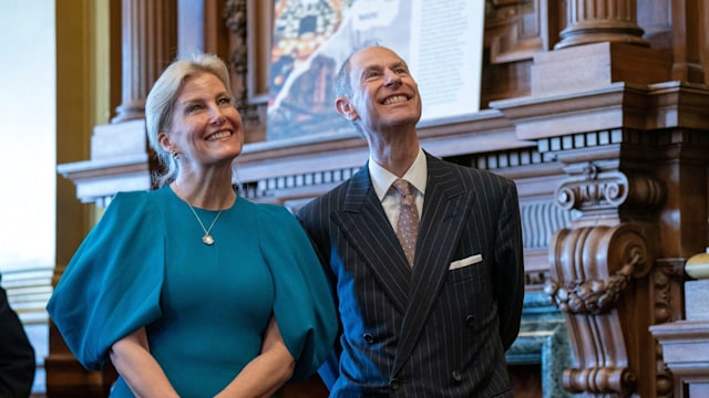 Duke and Duchess of Edingburgh smiling standing next to each other