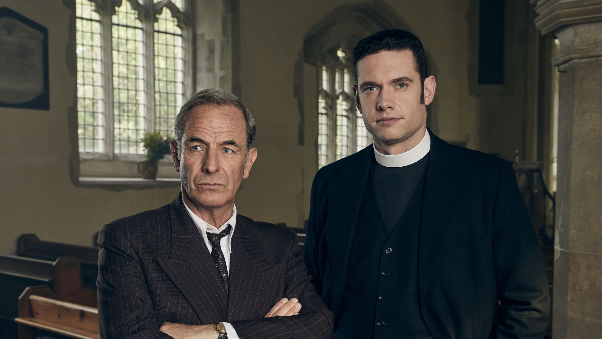 ROBSON GREEN as Geordie Keating and TOM BRITTANY Will Davenport in Grantchester 

