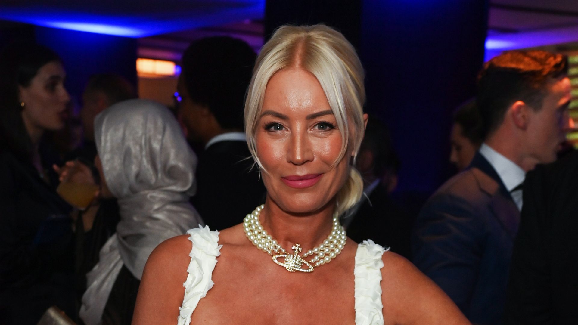 Denise van Outen channels royalty in pearl choker and chic mini dress for glamorous night out