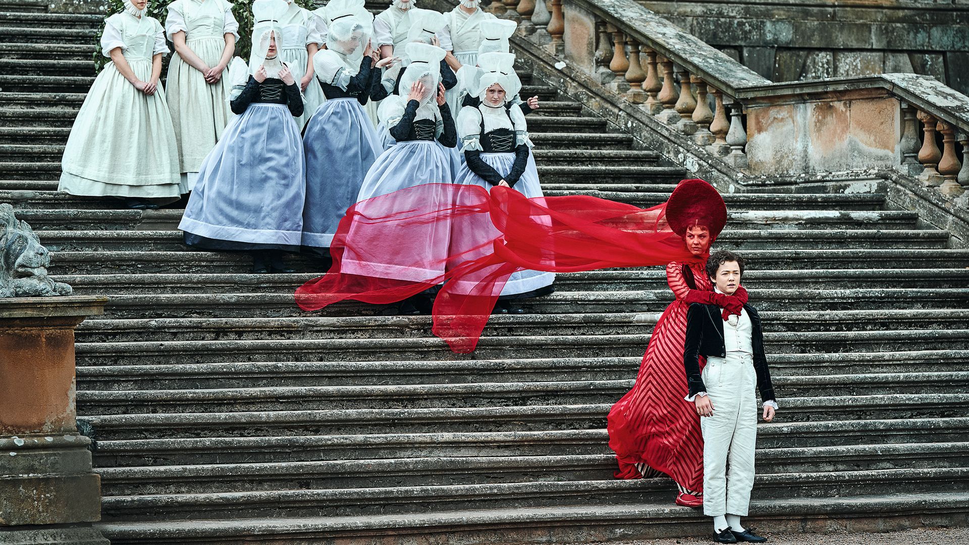 Mia Goth wears a stunning red costume in the film