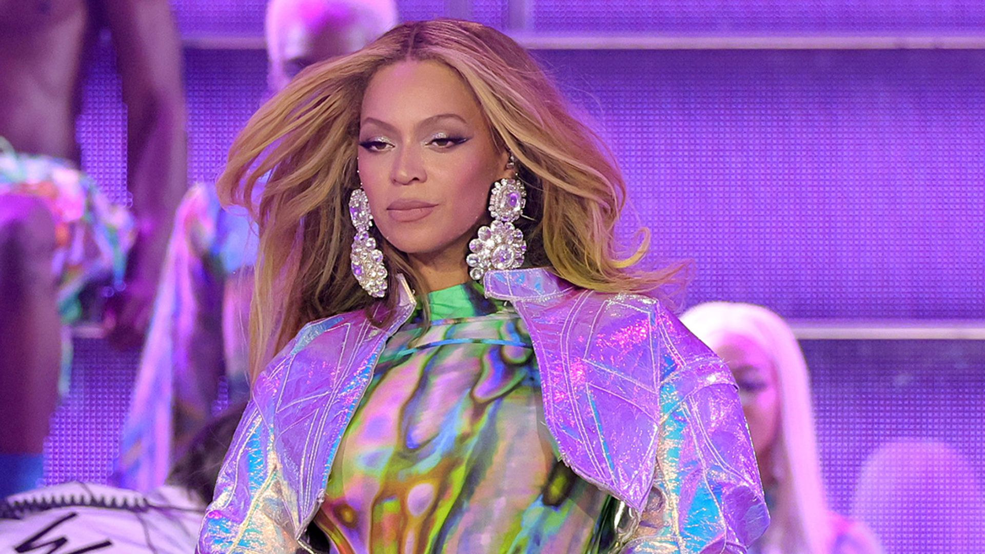 Beyonce wears bright and colourful outfit paired with huge silver earrings