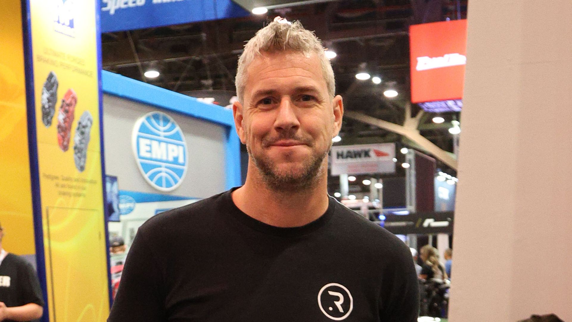 Ant Anstead smiling at a car show 