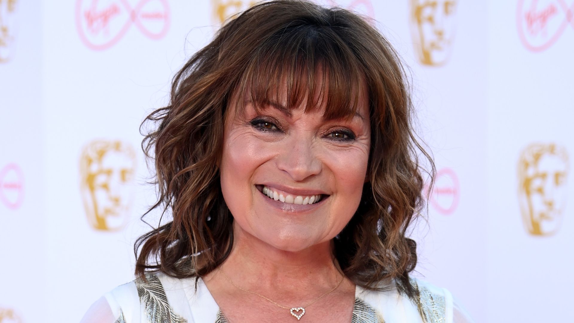lorraine kelly and television awards in white dress 