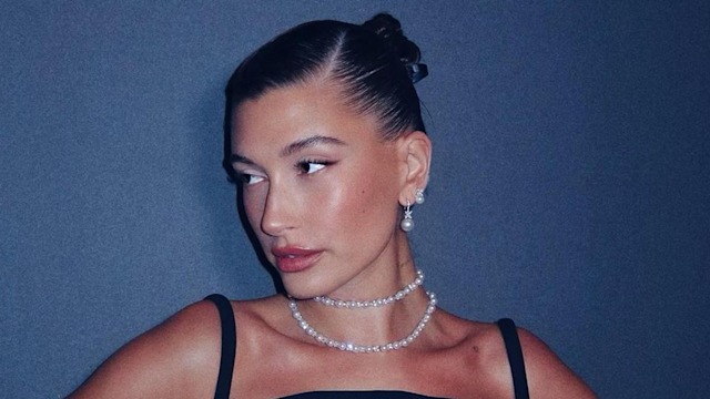 Hailey Bieber channels Audrey Hepburn with a slick back bun