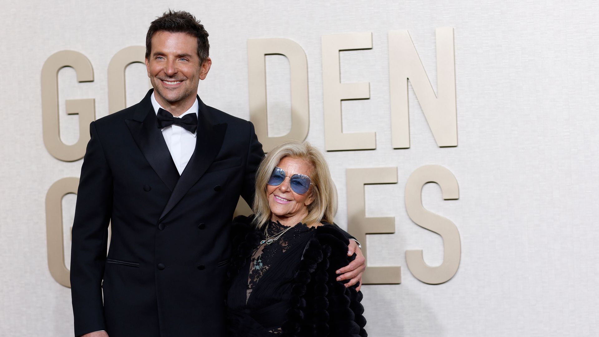 Bradley Cooper and Gloria Campano on the red carpet of the 81st Annual Golden Globe Awards held at the Beverly Hilton Hotel on January 7, 2024