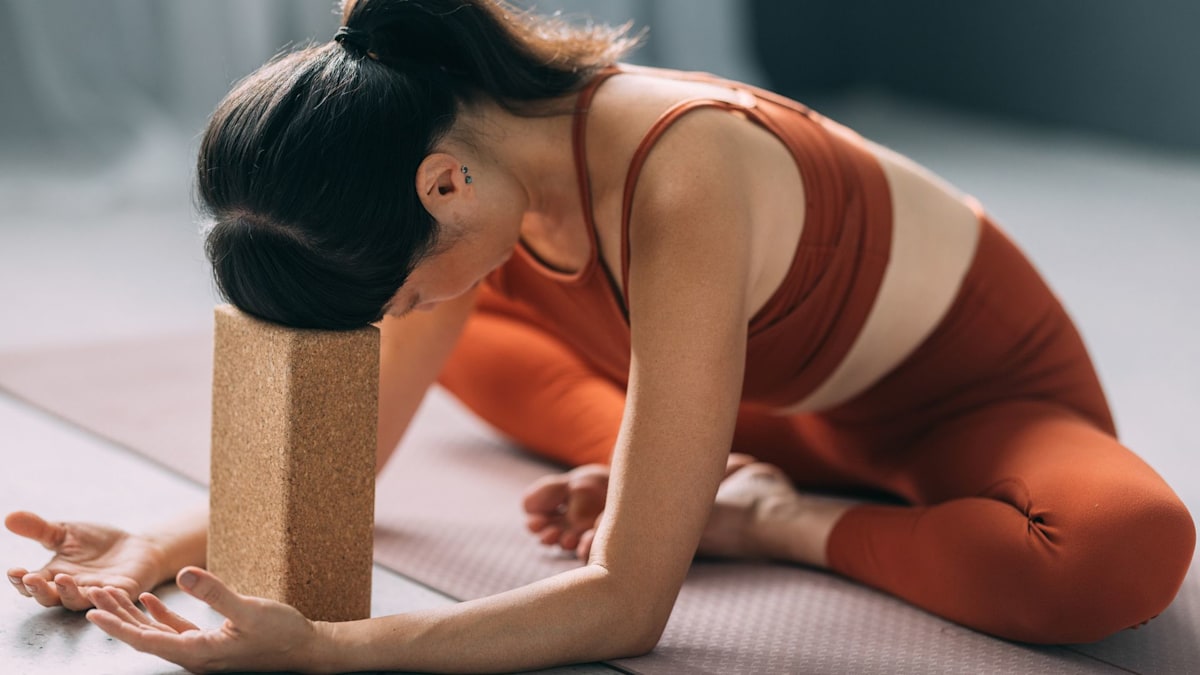Feeling burnt out? A restorative yoga expert’s 6 simple moves to reset your nervous system