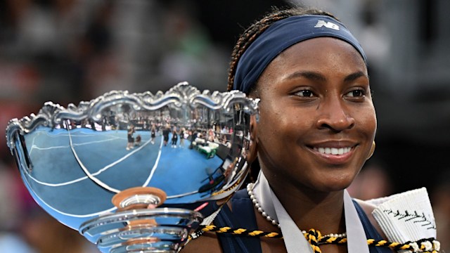 Coco Gauff holding trophy