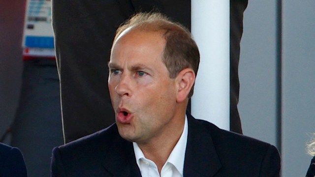 Prince Edward looking surprised in a smart outfit