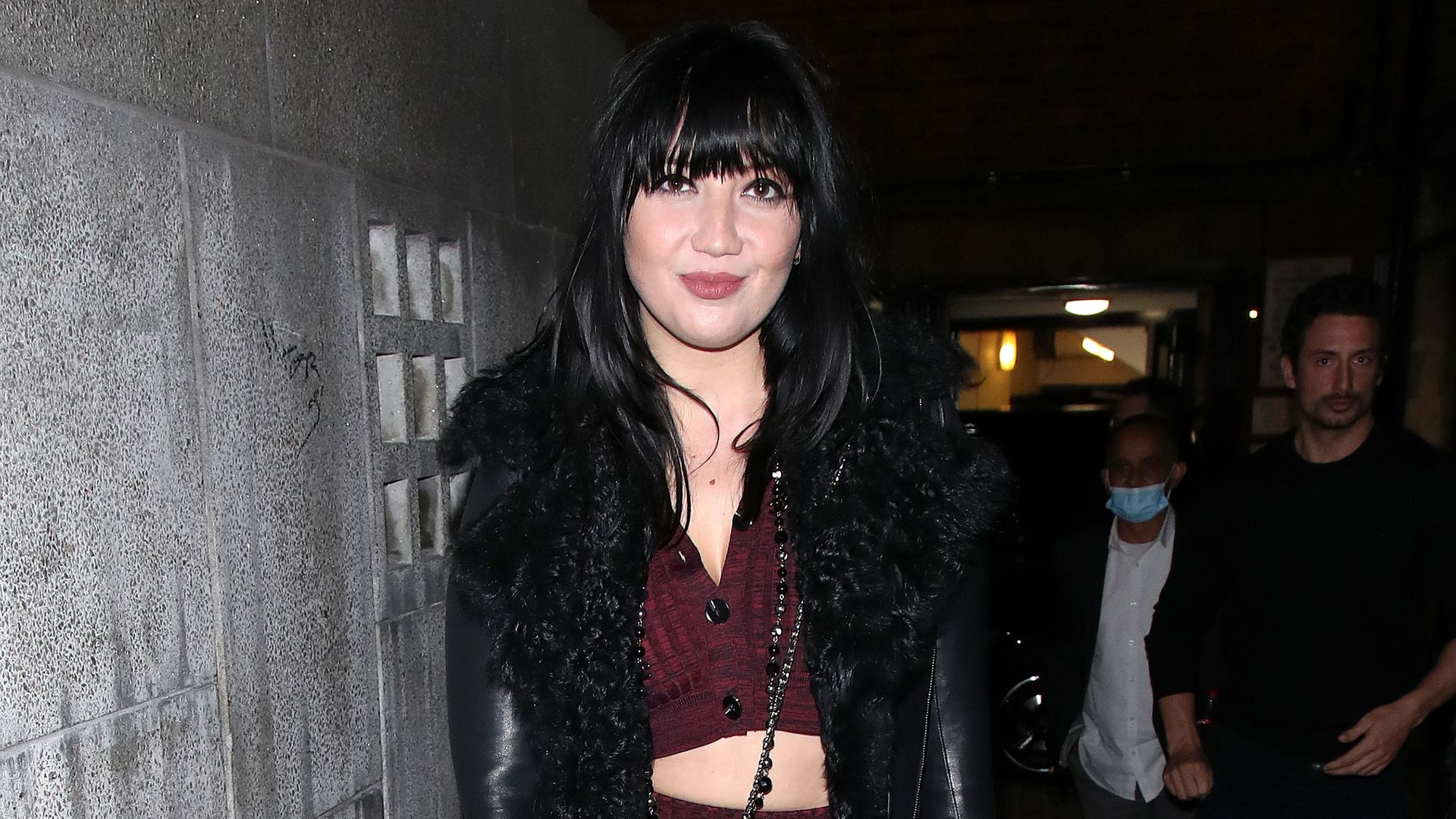 Daisy Lowe in burgundy outfit