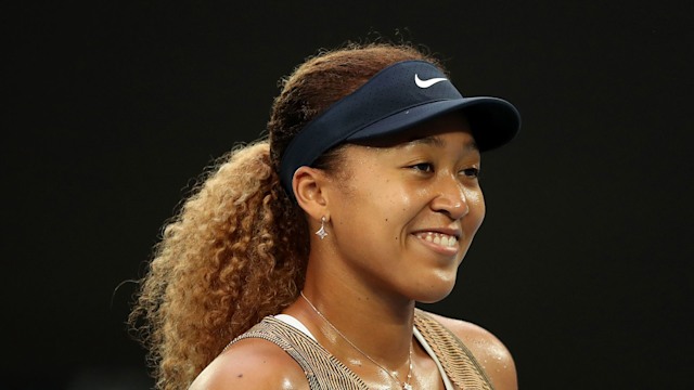 Naomi Osaka of Japan smiles following victory in her match against Maryna Zanevska of Belgium during day four of the Melbourne Summer Set at Melbourne Park on January 06, 2022 in Melbourne, Australia