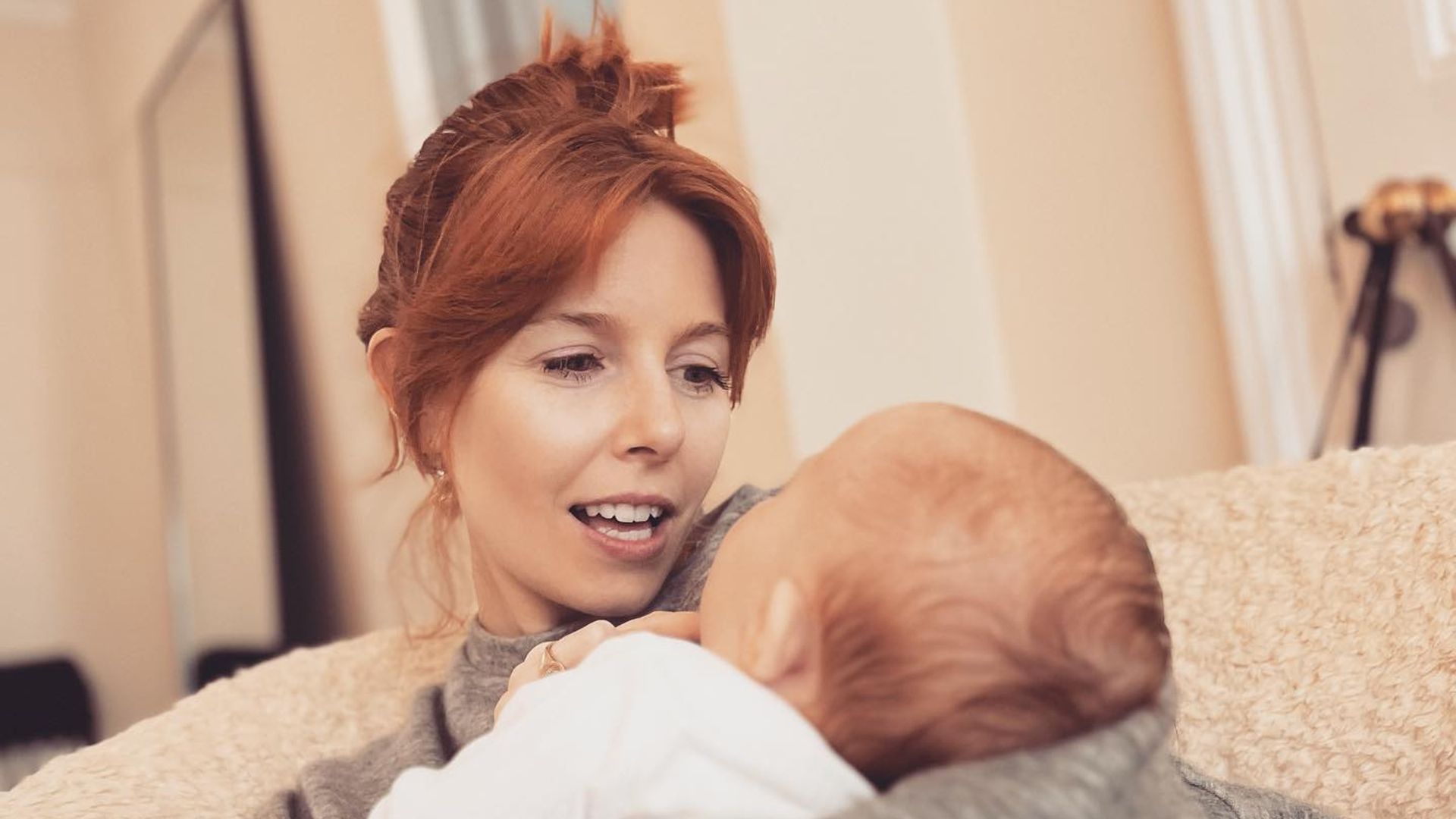 stacey dooley holding baby daughter 