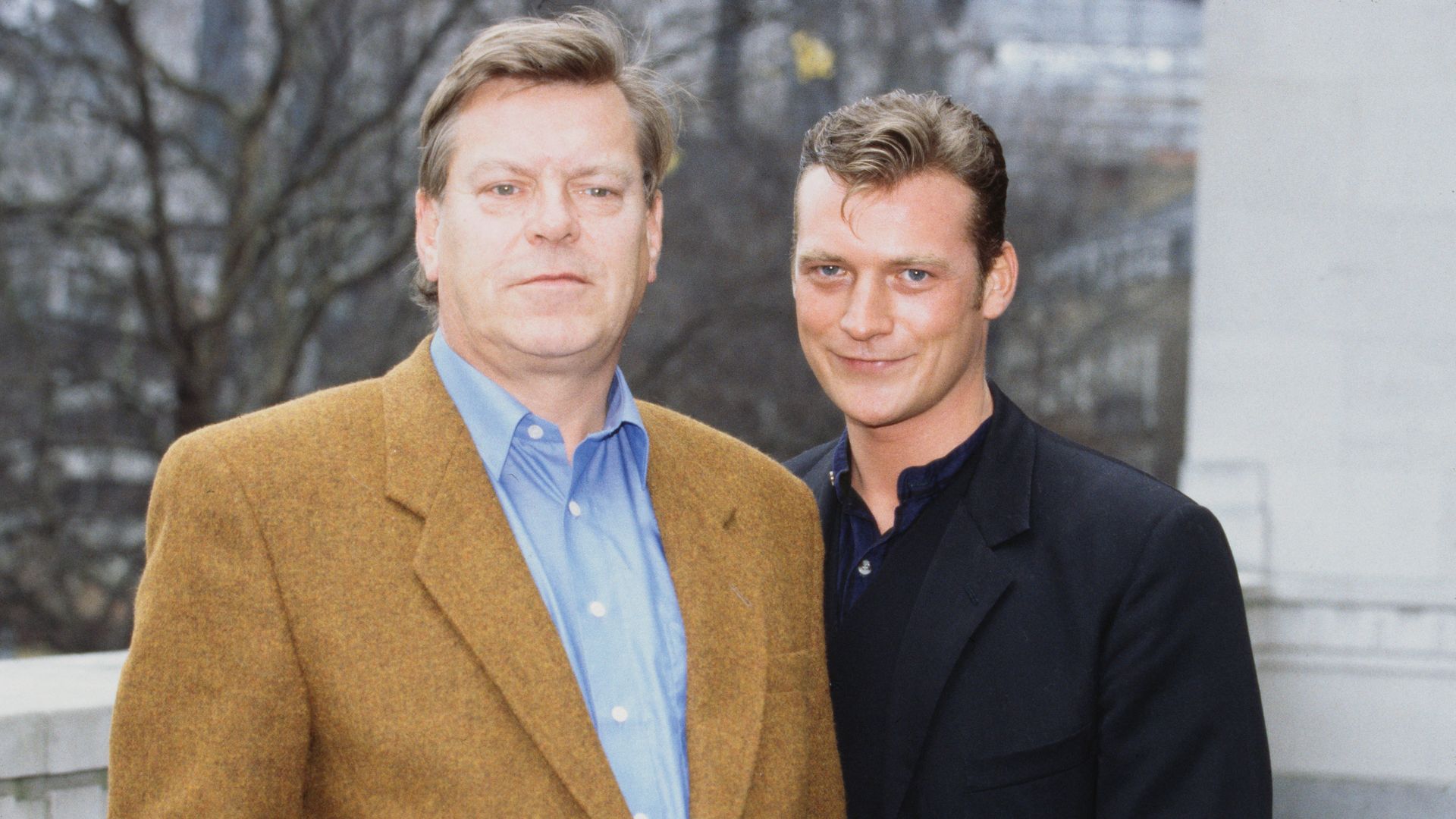 Warren Clarke (left) standing with Colin Buchanan (right)
