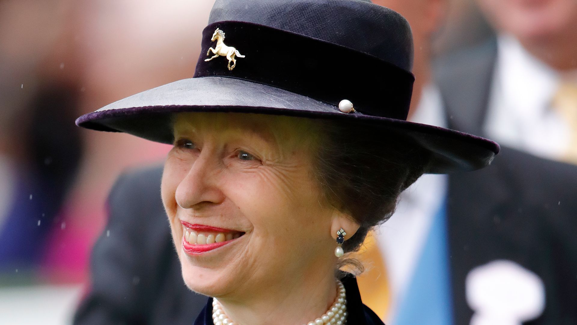 Princess Anne looks utterly fabulous in figure-skimming gold dress last worn 30 years ago