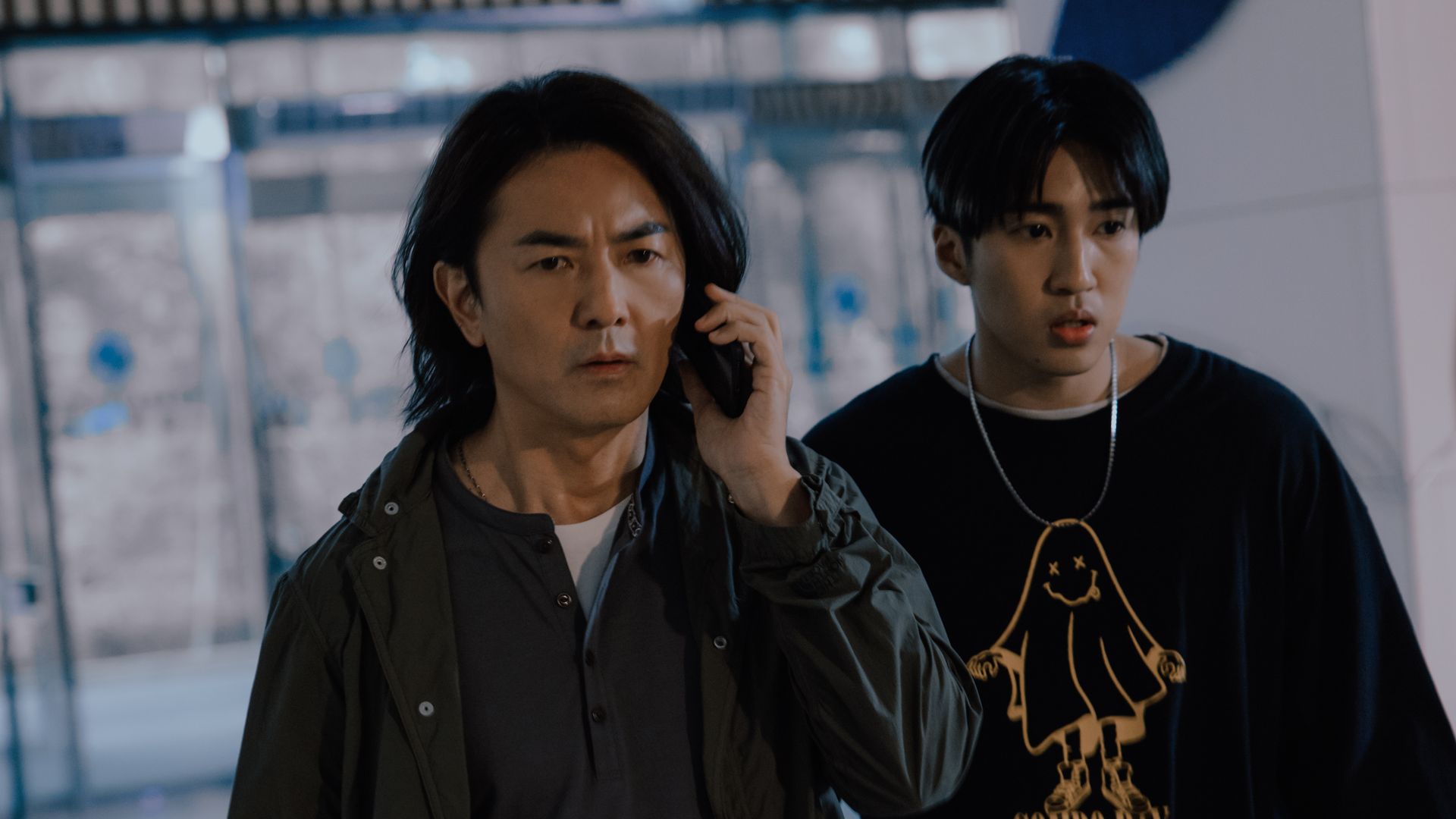 Two cast members in Million-Follower Detective