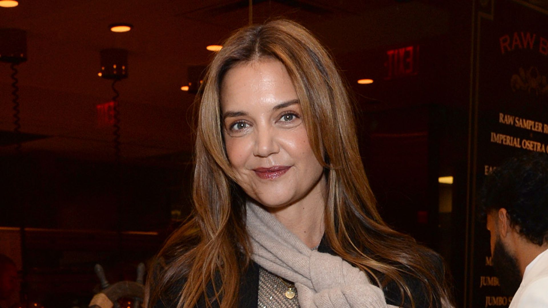 Katie Holmes in black blazer at the opening of Avra Estiatorio