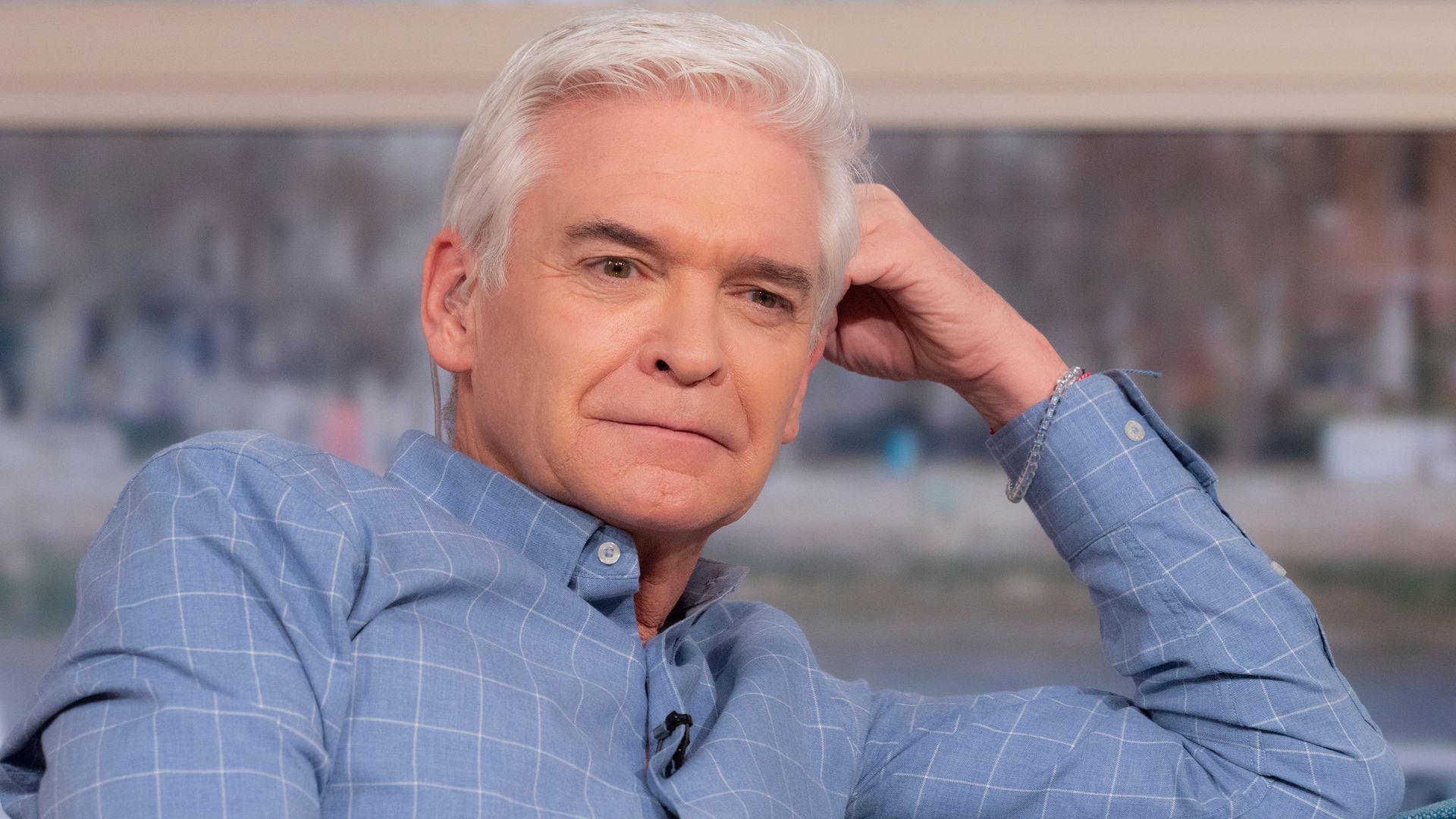 Phillip Schofield sits on sofa on This Morning 