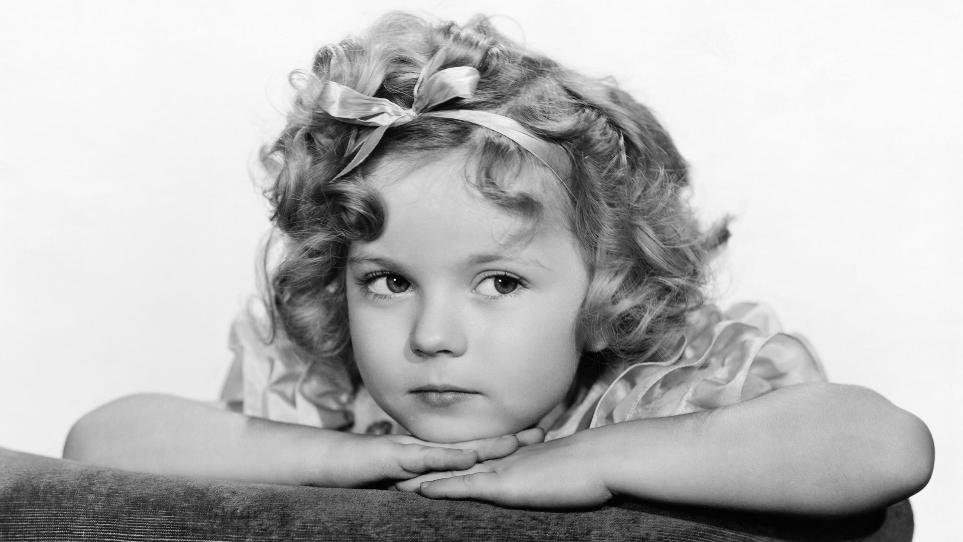 Shirley Temple, Hollywood's youngest leading lady, is a starry-eyed youngster who has just passed her fourth birthday having already played the lead in several Hollywood productions. She is at present appearing in the Paramount studios production of B.P. Schulberg's Little Miss Marker, starring opposite Adolphe Menjou. (Photo by �� John Springer Collection/CORBIS/Corbis via Getty Images)